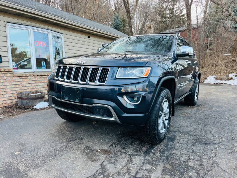 2014 Jeep Grand Cherokee for sale at Rams Auto Sales LLC in South Saint Paul MN