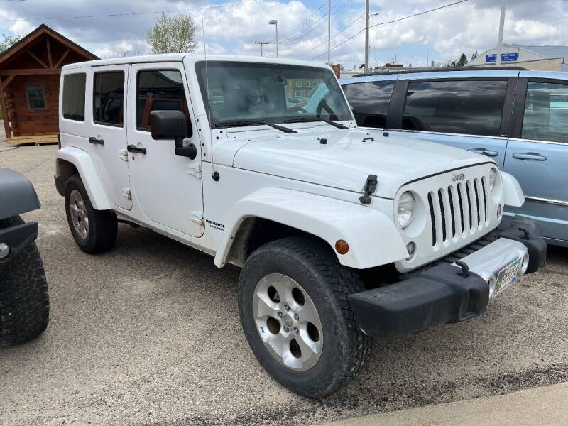 2014 Jeep Wrangler Unlimited for sale at BEAR CREEK AUTO SALES in Spring Valley MN