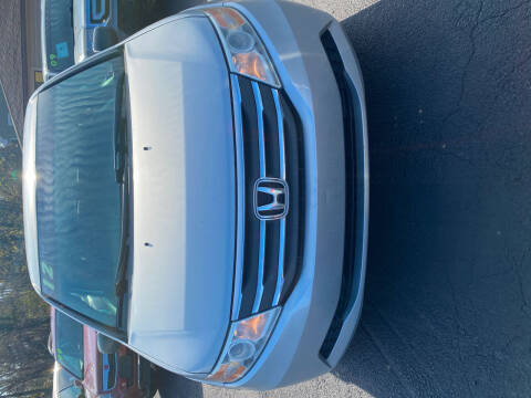 2012 Honda Odyssey for sale at Right Choice Automotive in Rochester NY