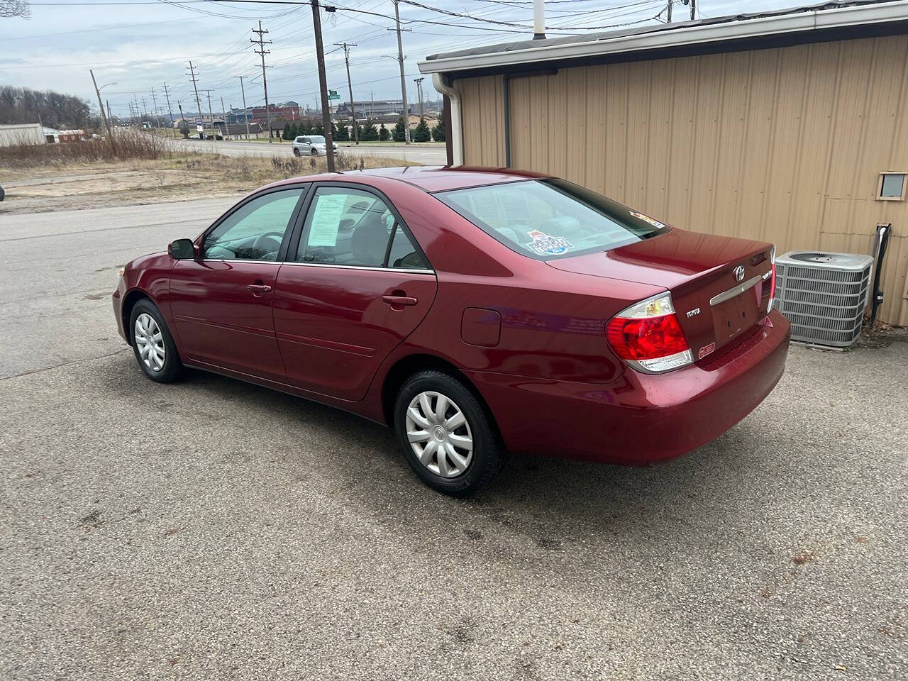 2005 Toyota Camry for sale at BNM AUTO GROUP in GIRARD, OH