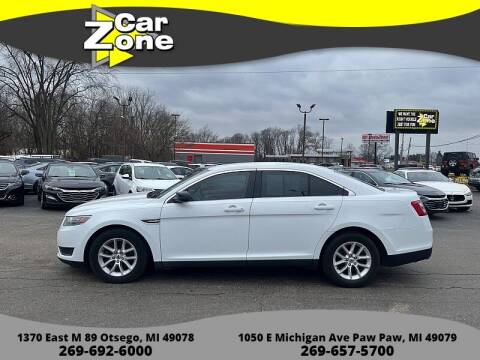 2015 Ford Taurus for sale at Car Zone in Otsego MI