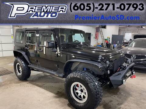 2015 Jeep Wrangler Unlimited for sale at Premier Auto in Sioux Falls SD