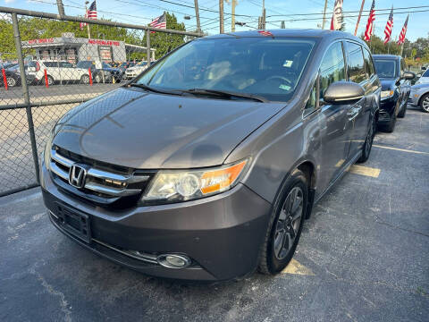 2014 Honda Odyssey for sale at America Auto Wholesale Inc in Miami FL