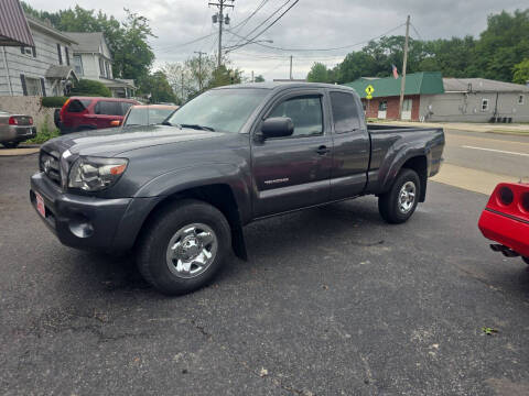 2009 Toyota Tacoma for sale at Maximum Auto Group II INC in Cortland OH