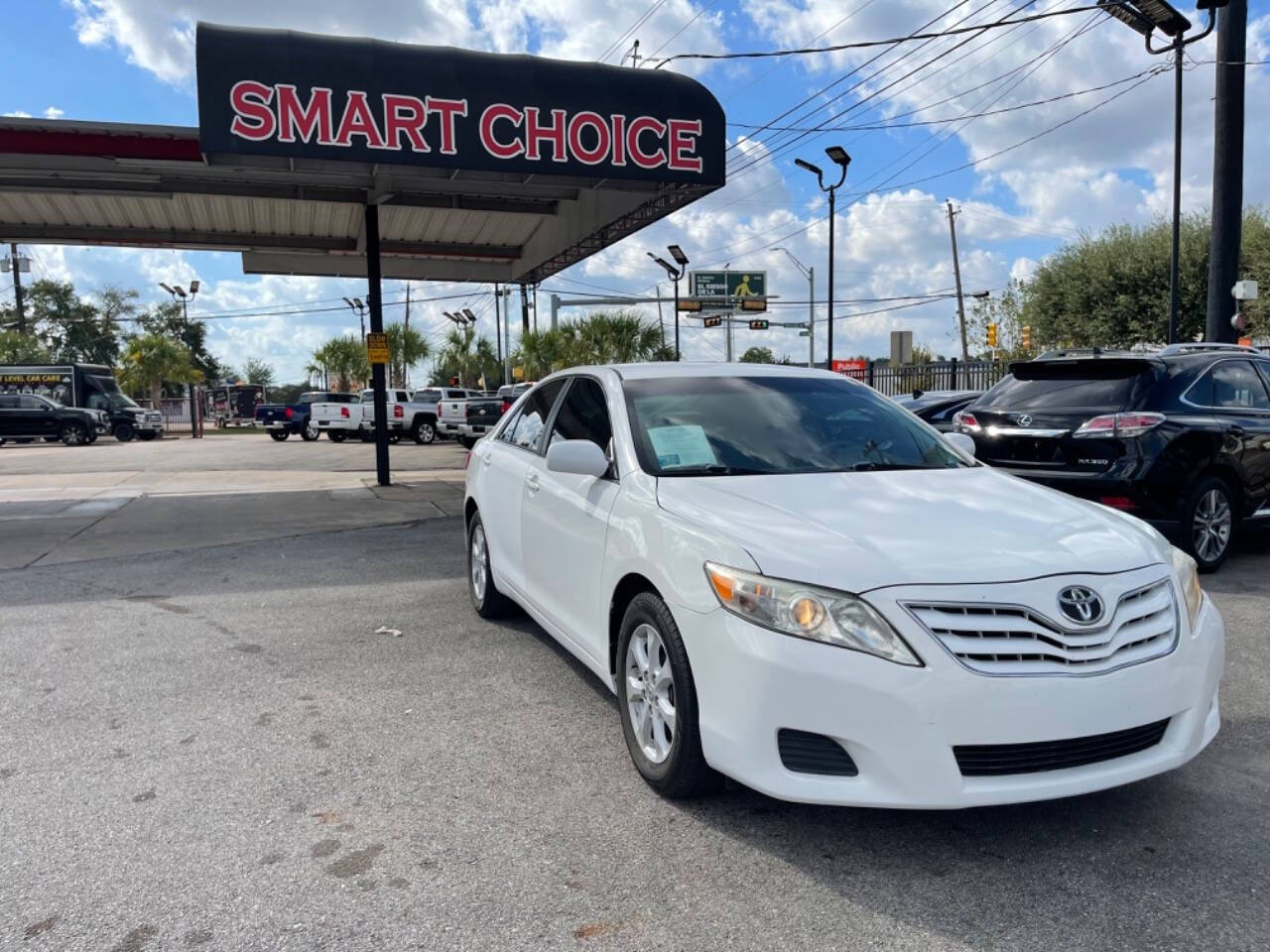 2011 Toyota Camry for sale at SMART CHOICE AUTO in Pasadena, TX