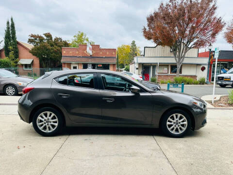 2015 Mazda MAZDA3 i Grand Touring