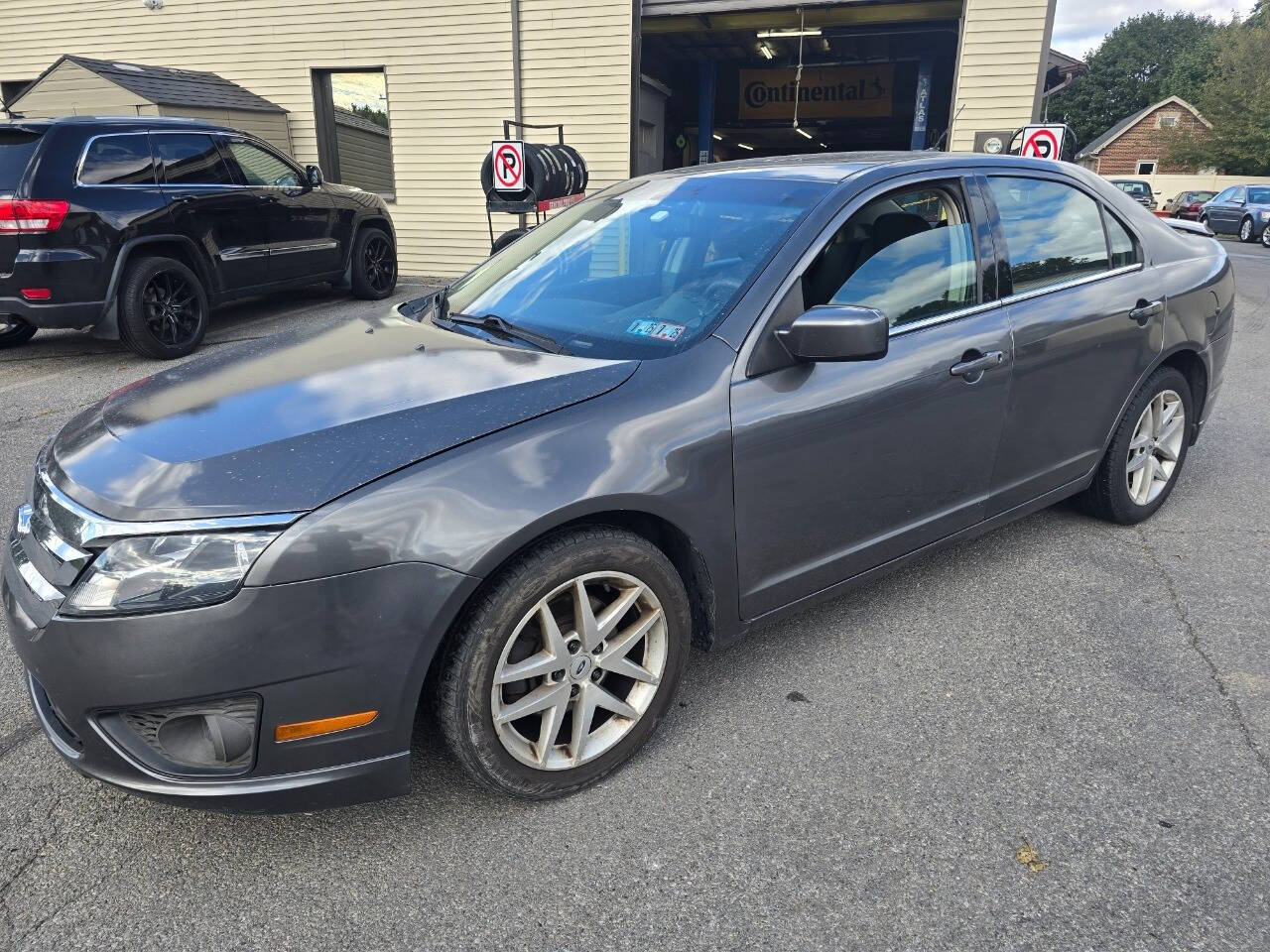 2010 Ford Fusion for sale at QUEENSGATE AUTO SALES in York, PA