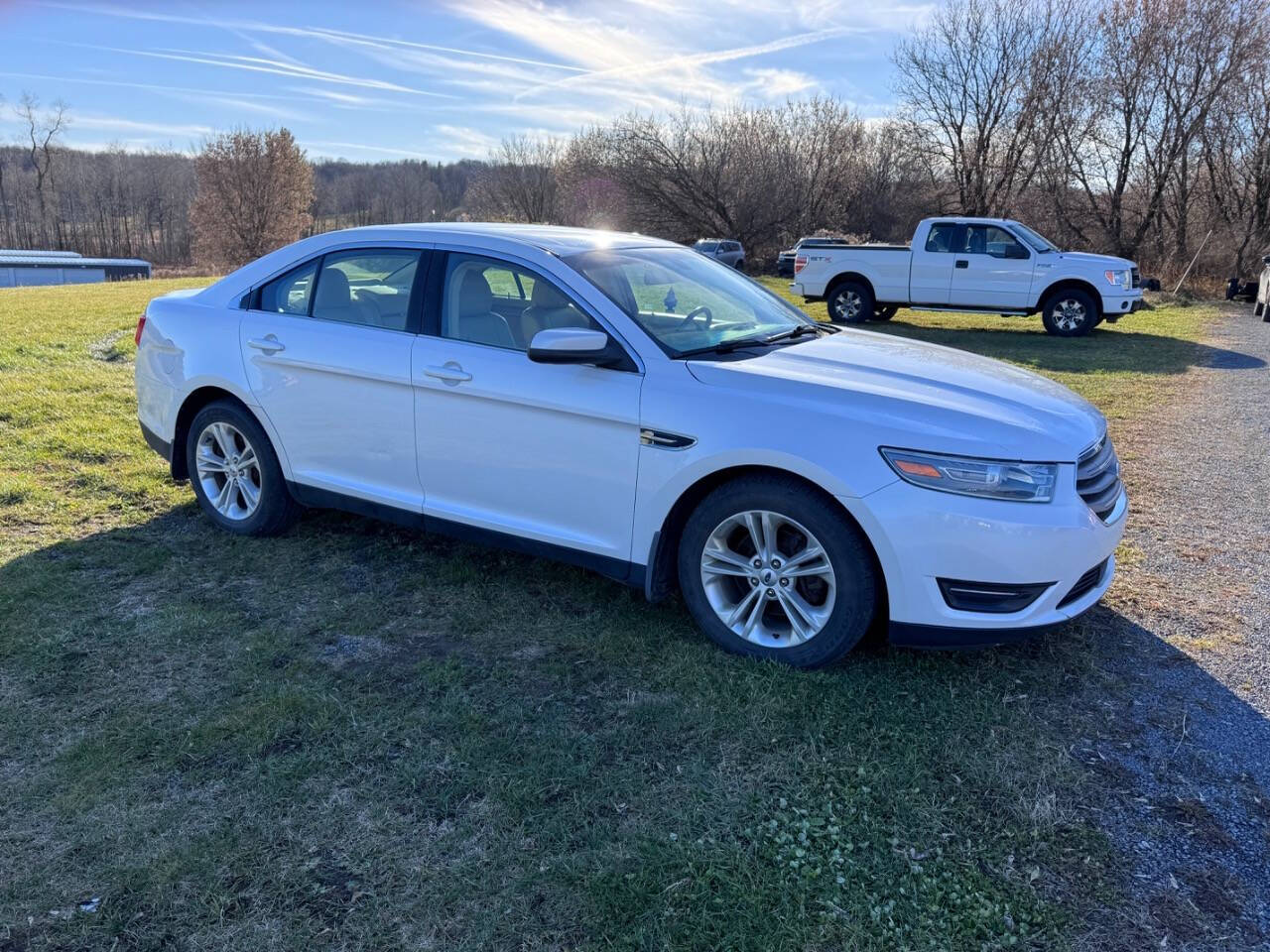 2013 Ford Taurus for sale at Riverside Motors in Glenfield, NY