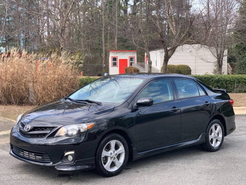 2011 Toyota Corolla for sale at Triangle Motors Inc in Raleigh NC