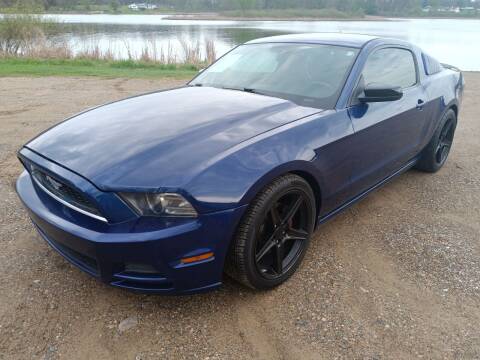 2014 Ford Mustang for sale at Rombaugh's Auto Sales in Battle Creek MI