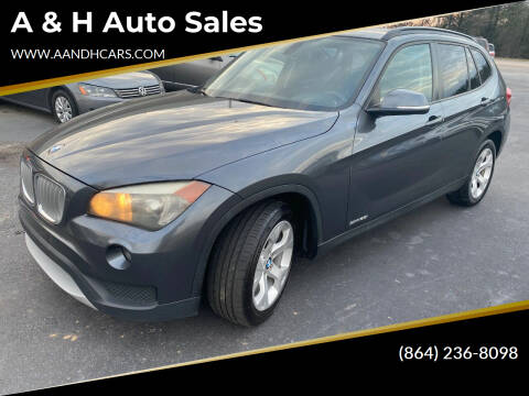 2014 BMW X1 for sale at A & H Auto Sales in Greenville SC