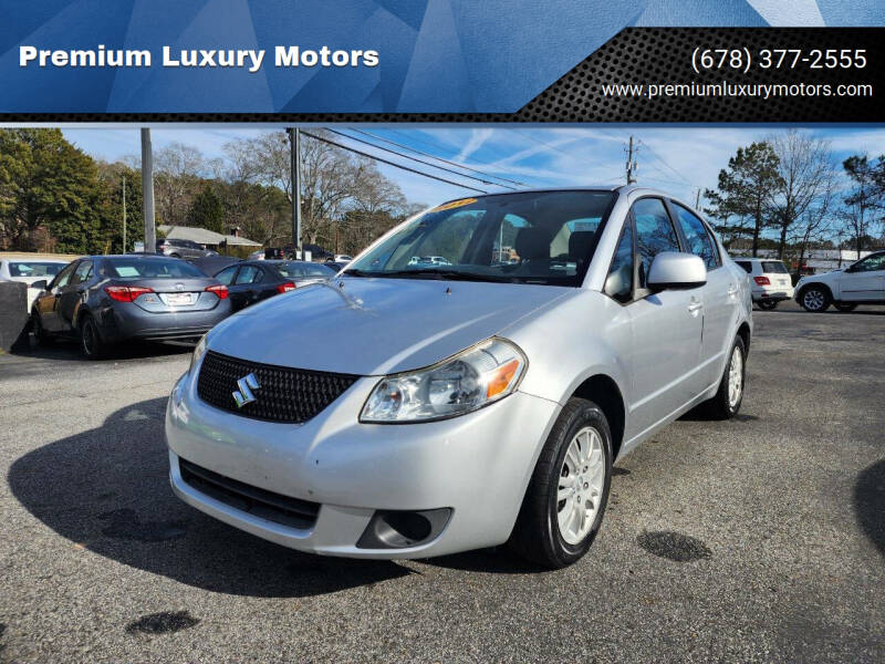 2012 Suzuki SX4 for sale at Premium Luxury Motors in Grayson GA