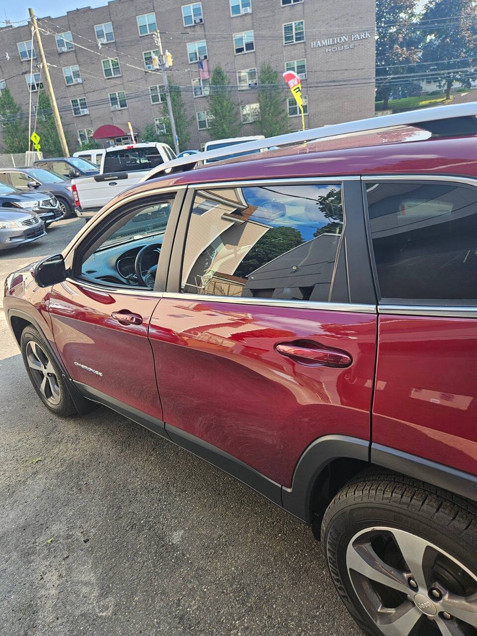 2019 Jeep Cherokee for sale at RENOS AUTO SALES LLC in Waterbury, CT