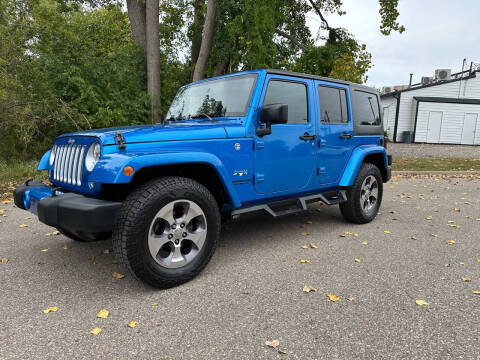 2016 Jeep Wrangler Unlimited for sale at Family Auto Sales llc in Fenton MI