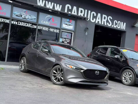 2019 Mazda Mazda3 Hatchback for sale at CARUCARS LLC in Miami FL