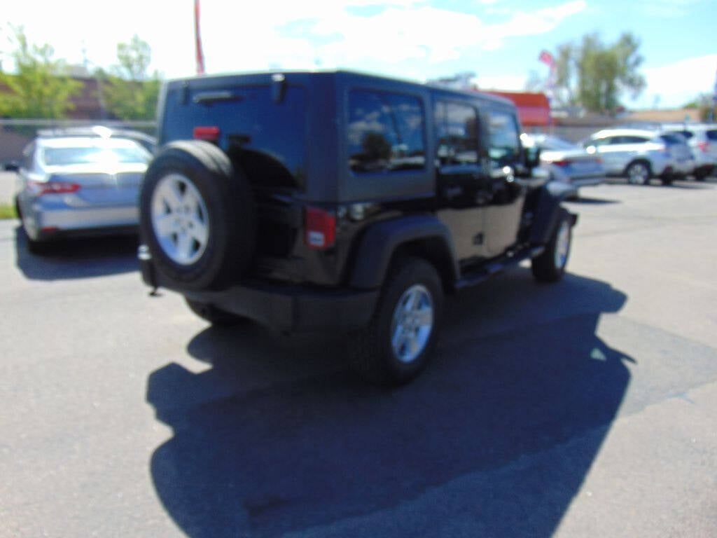 2014 Jeep Wrangler Unlimited for sale at Avalanche Auto Sales in Denver, CO