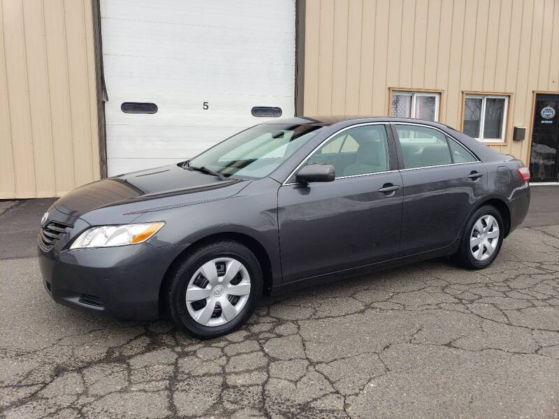 2009 Toyota Camry for sale at Massirio Enterprises in Middletown CT