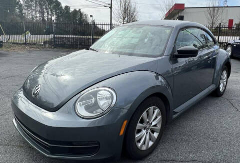2013 Volkswagen Beetle for sale at DK Auto LLC in Stone Mountain GA