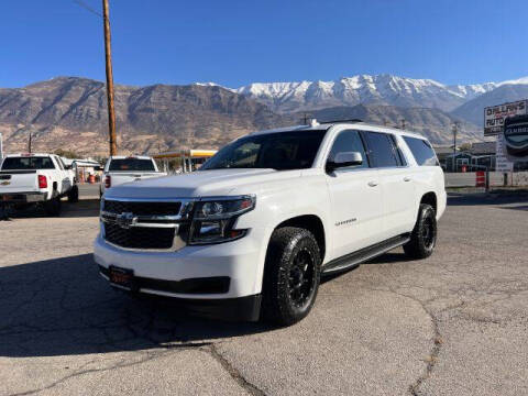 2018 Chevrolet Suburban for sale at Revolutionary Auto in Pleasant Grove UT