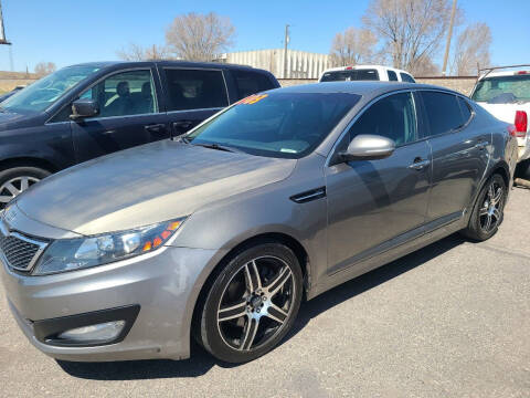2012 Kia Optima for sale at BELOW BOOK AUTO SALES in Idaho Falls ID