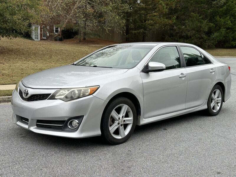 2012 Toyota Camry for sale at SHURE AUTO SALES in Snellville, GA