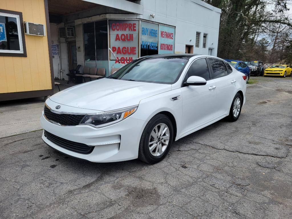 2016 Kia Optima for sale at DAGO'S AUTO SALES LLC in Dalton, GA