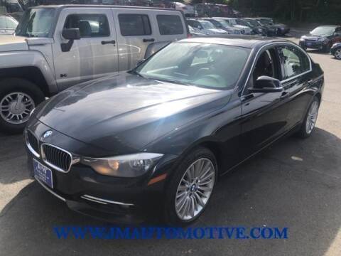 2014 BMW 3 Series for sale at J & M Automotive in Naugatuck CT