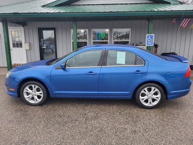 2012 Ford Fusion for sale at Clarks Auto Sales Inc in Lakeview, MI