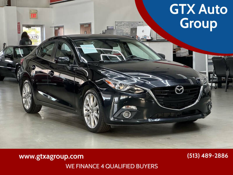 2014 Mazda MAZDA3 for sale at GTX Auto Group in West Chester OH