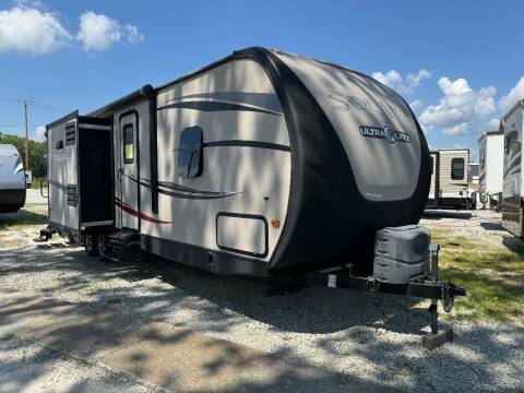 2014 Palomino Solaire 297RLDS for sale at Kentuckiana RV Wholesalers in Charlestown IN