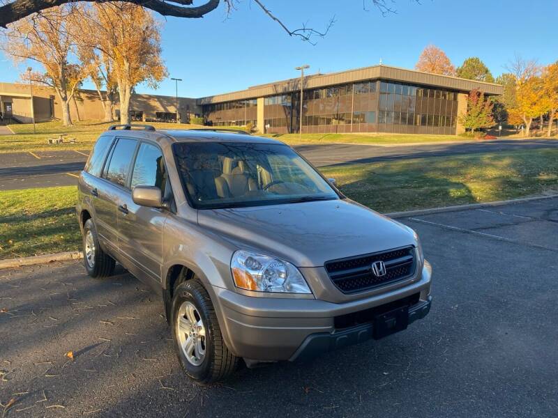 2004 Honda Pilot for sale at QUEST MOTORS in Englewood CO