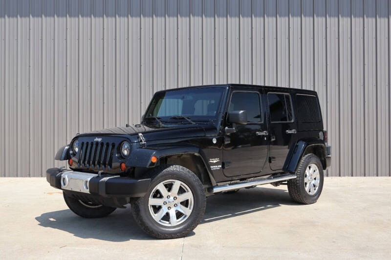 2013 Jeep Wrangler Unlimited for sale at Andover Auto Group, LLC. in Argyle TX