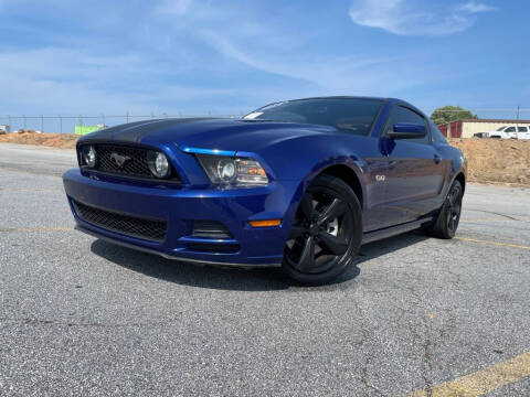 2014 Ford Mustang for sale at 4 Brothers Auto Sales LLC in Brookhaven GA