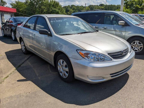 2003 Toyota Camry for sale at TEMPLE AUTO SALES in Zanesville OH