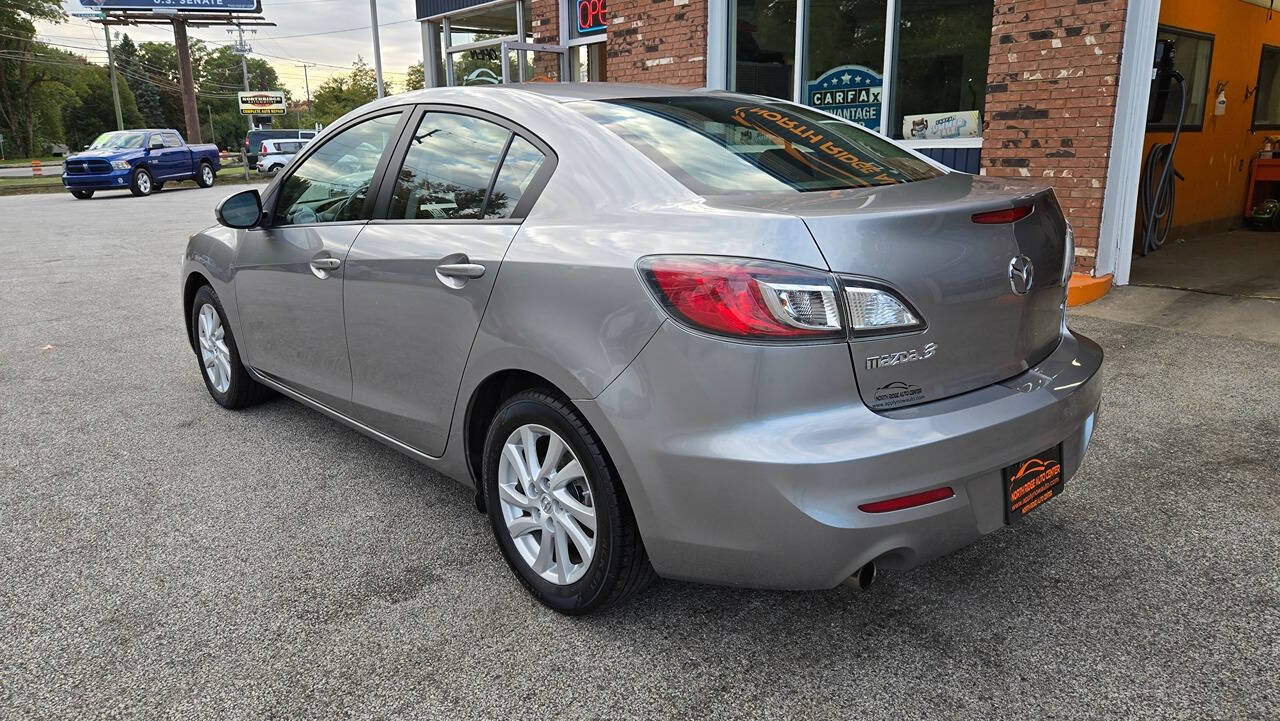 2012 Mazda Mazda3 for sale at North Ridge Auto Center LLC in Madison, OH