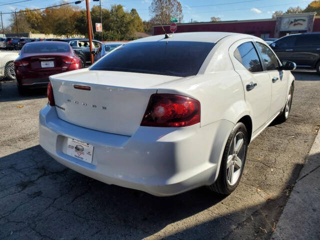 2013 Dodge Avenger for sale at DAGO'S AUTO SALES LLC in Dalton, GA