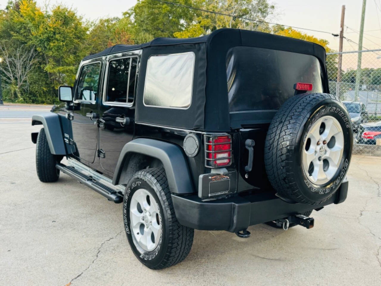 2012 Jeep Wrangler Unlimited for sale at AUTO LUX INC in Marietta, GA