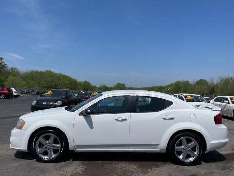 2014 Dodge Avenger for sale at CARS PLUS CREDIT in Independence MO