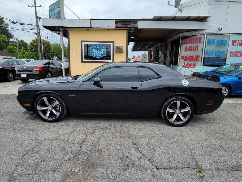 2014 Dodge Challenger for sale at DAGO'S AUTO SALES LLC in Dalton, GA