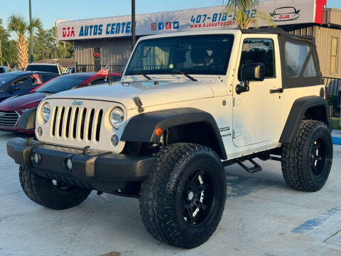 2014 Jeep Wrangler for sale at DJA Autos Center in Orlando FL