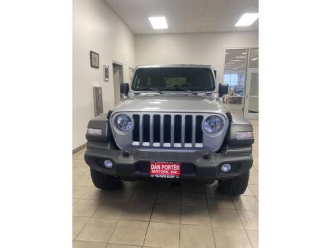 2021 Jeep Wrangler Unlimited for sale at DAN PORTER MOTORS in Dickinson ND