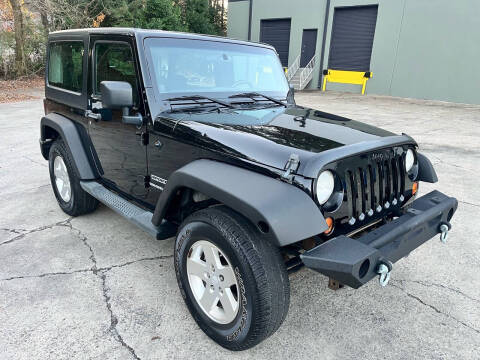 2012 Jeep Wrangler for sale at Legacy Motor Sales in Norcross GA