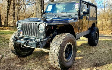 2006 Jeep Wrangler for sale at GOLDEN RULE AUTO in Newark OH