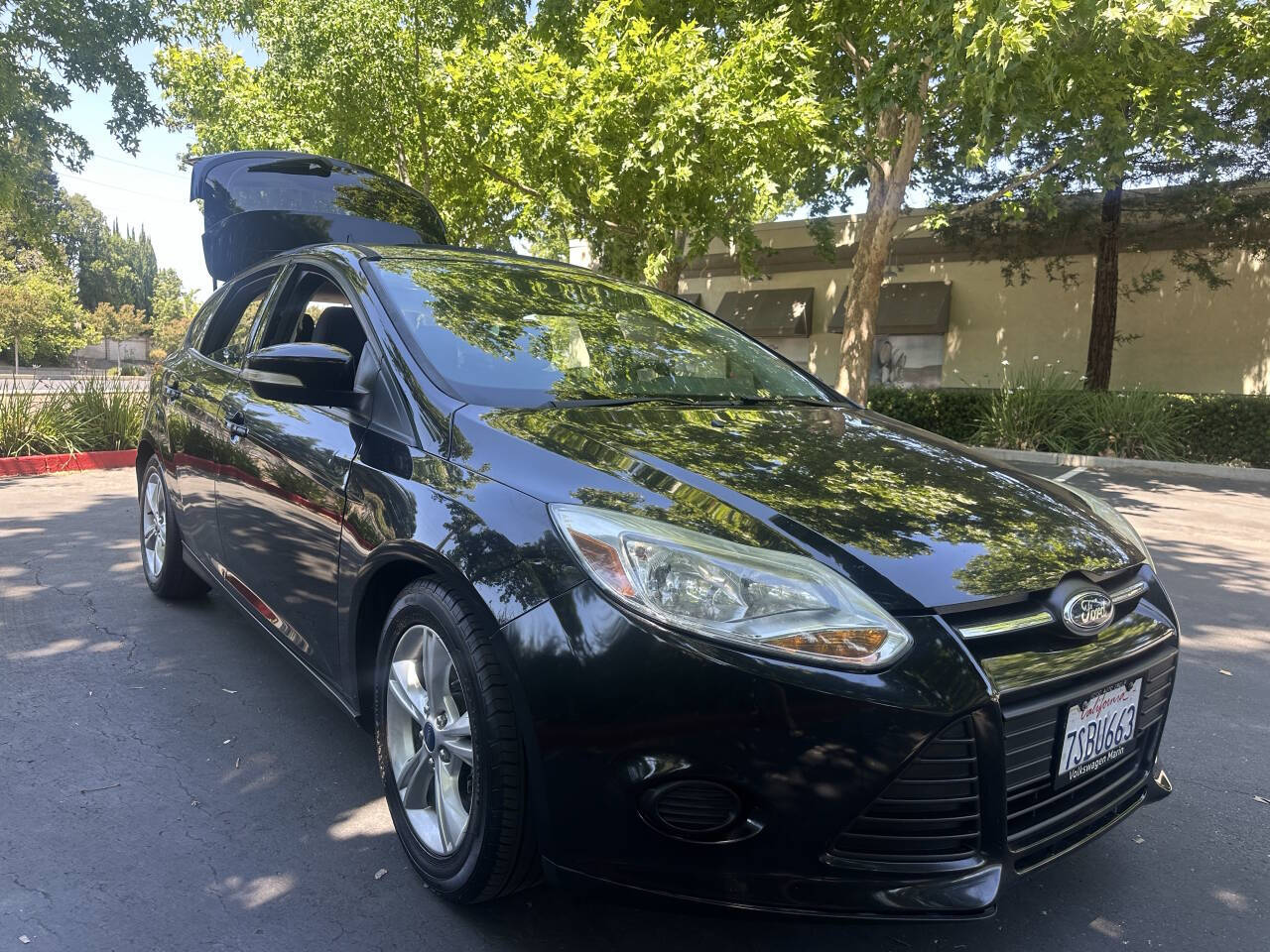 Black 2014 Ford Focus SE SE 4dr Hatchback 1