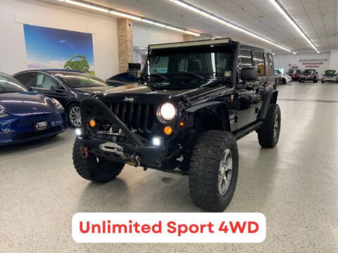 2015 Jeep Wrangler Unlimited for sale at Dixie Motors in Fairfield OH