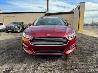 2014 Ford Fusion for sale at Long & Sons Auto Sales in Detroit MI