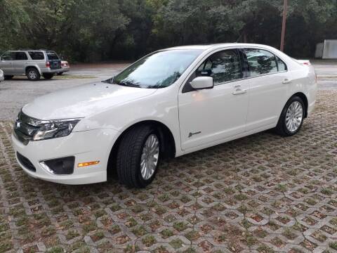 2012 Ford Fusion Hybrid for sale at Royal Auto Mart in Tampa FL