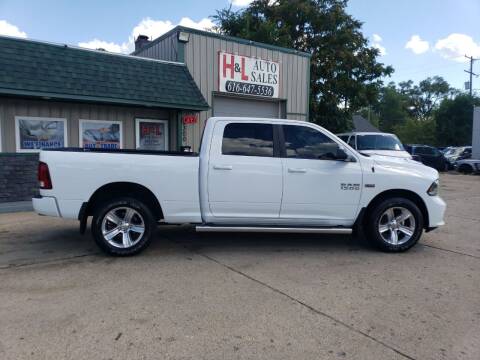 2015 RAM Ram Pickup 1500 for sale at H & L AUTO SALES LLC in Wyoming MI