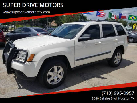 2009 Jeep Grand Cherokee for sale at SUPER DRIVE MOTORS in Houston TX