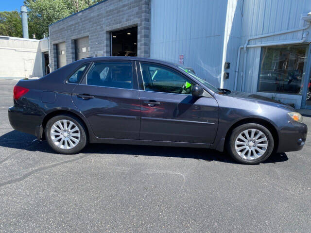 2011 Subaru Impreza for sale at Auto Shop in Wyoming, MI